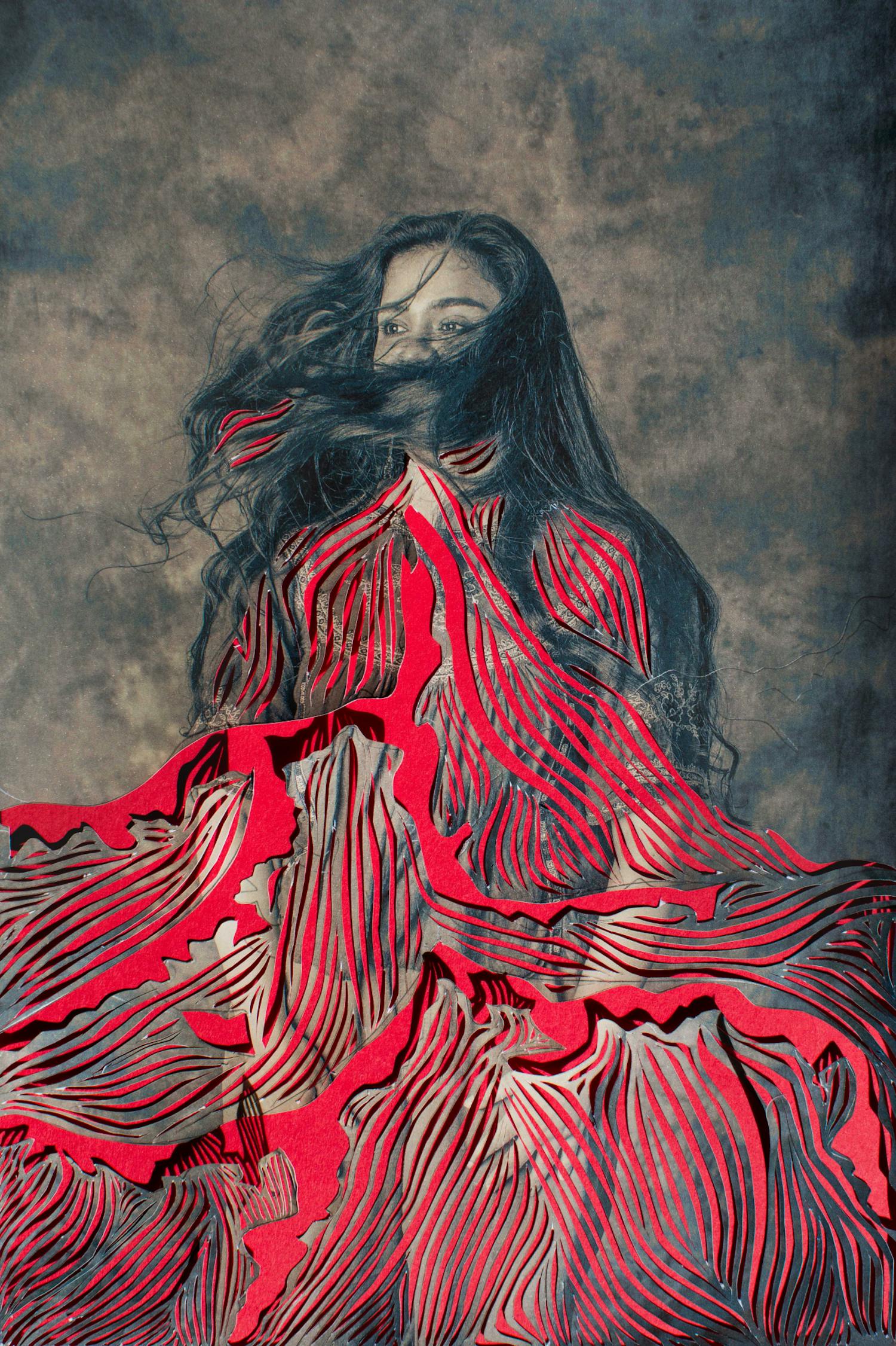 Vinnare av Kreativ Kvinna med pappersklipp